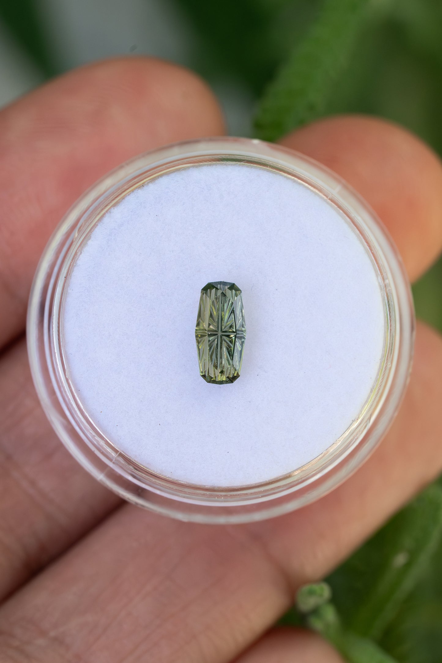 0.76 Carat Olive Green Fantasy Cut Cushion Montana Sapphire