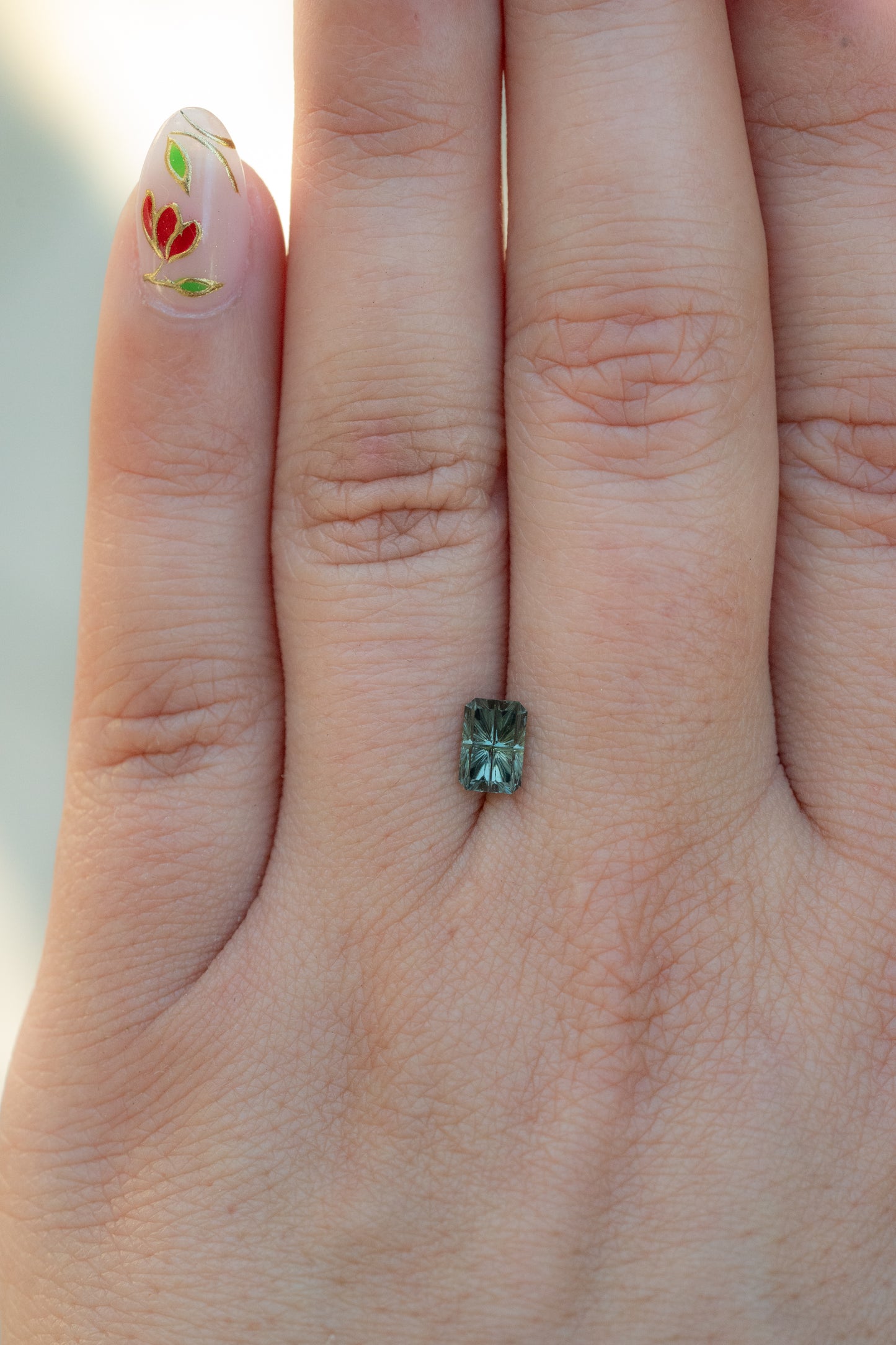 0.97 Carat Two-Tone Green Fantasy Cut Kenyan Sapphire