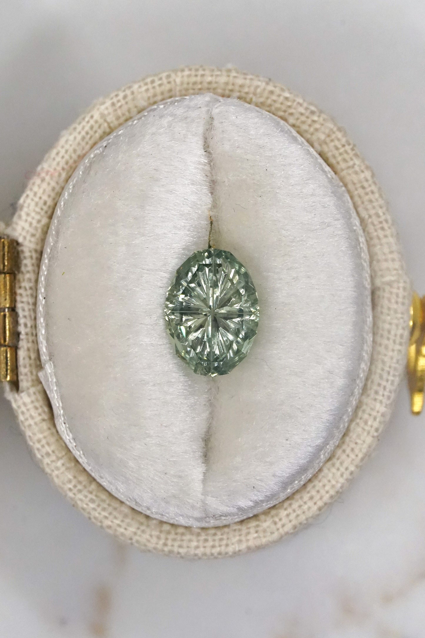 1.46 Carat Pale Green to Teal Fantasy Cut Oval Montana Sapphire